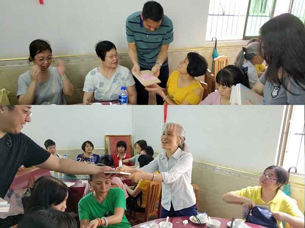 1558942056731325.jpg 王同心戴韜發慰問金給群眾.jpg